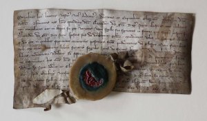 BL 1:确认国王亚历山大三世的宪章，授予黑修士每年从敦巴顿镇的租金中获得10英镑。(1304年10月21日)