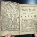 Opening section and woodcut illustration in Sanders's 1727 edition of Pilgrim's Progress in 8-pt type